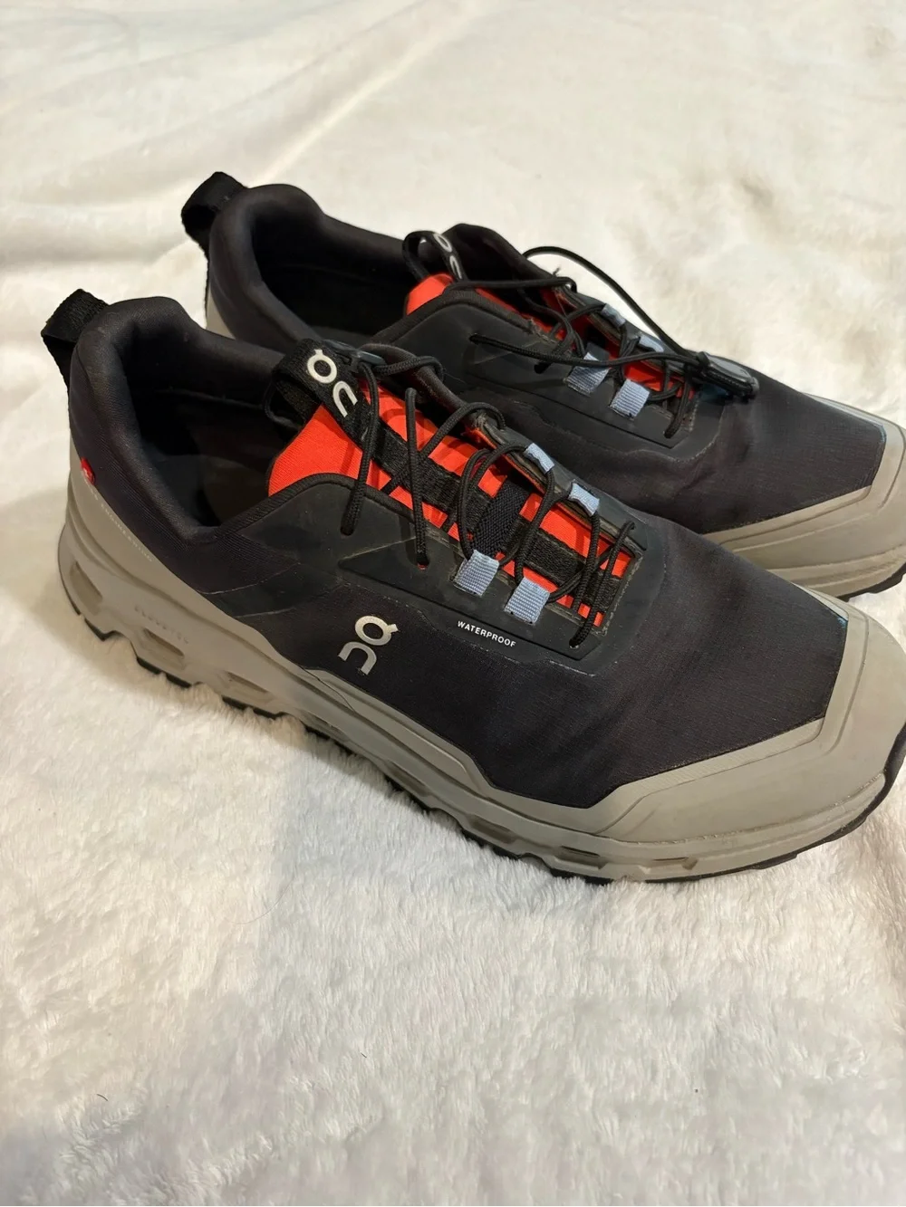 On Running Men's Trail Sneakers in Black, Gray and Red Accent